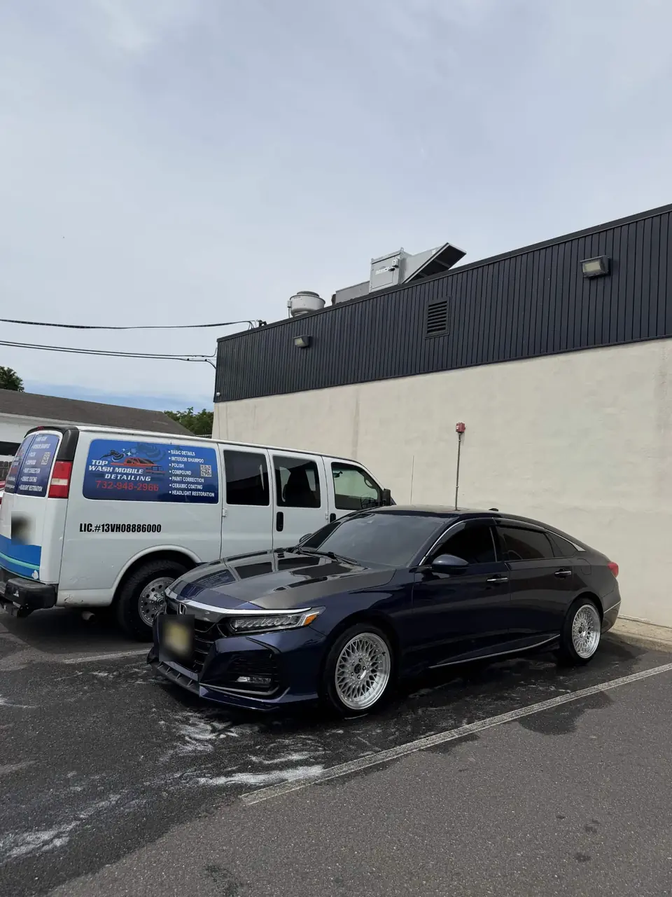 Navy Honda Accord with carbon hood next to the Top Wash Mobile Detailing van