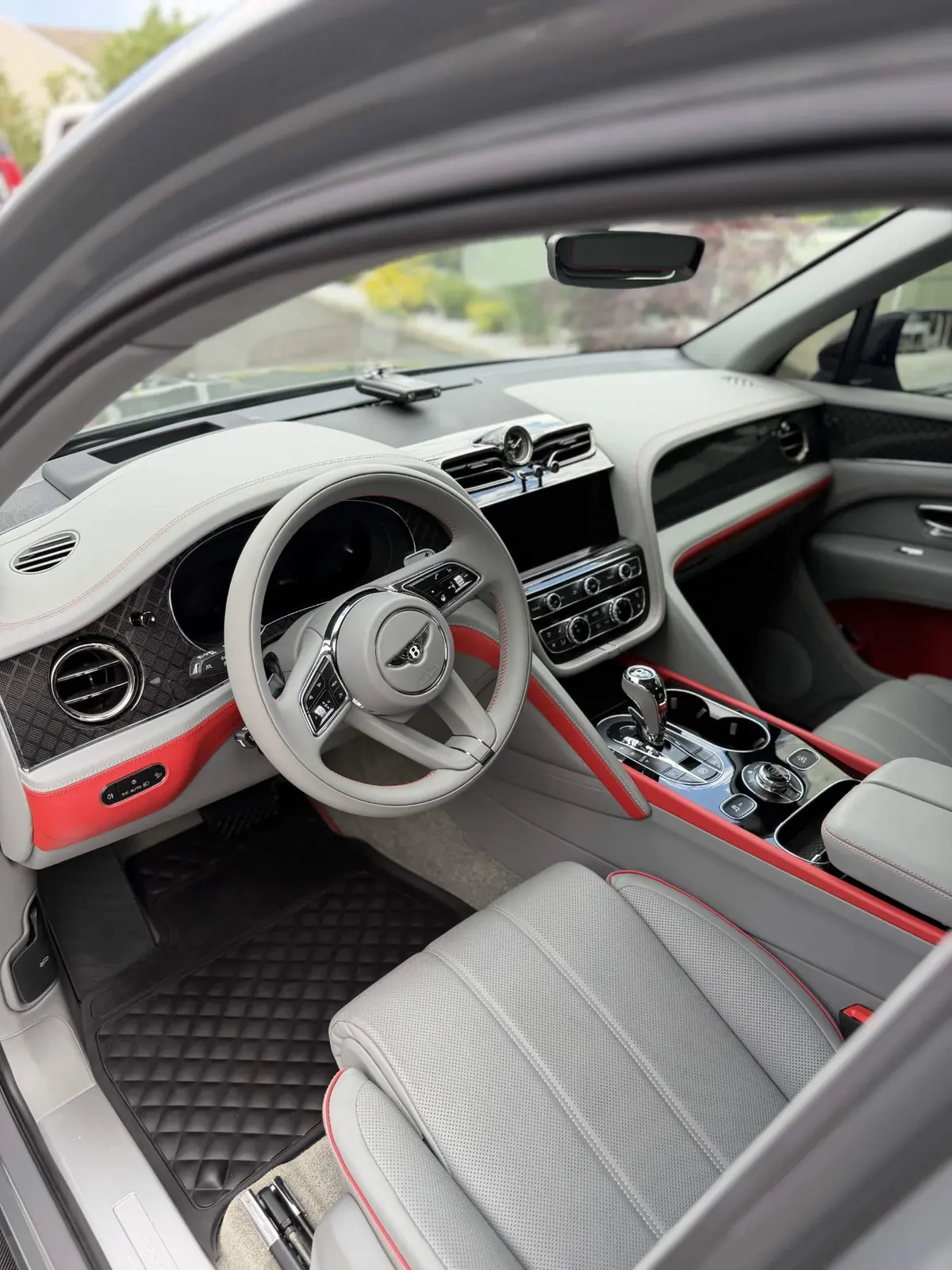 Grey and red Bentley Bentayga interior after a detail