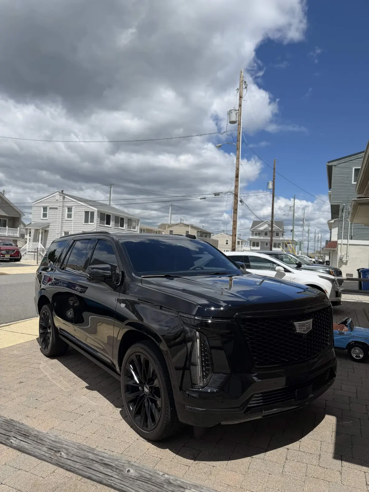 Black Cadillac Escalade with deep gloss