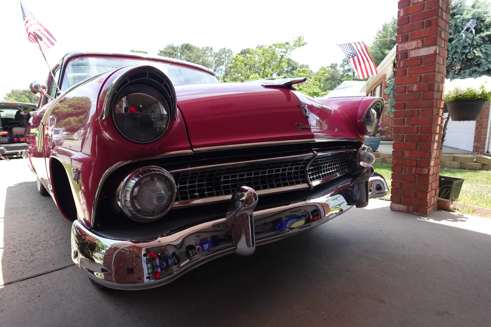 Mirror-polished chrome bumper on a 1955 Ford Fairlane