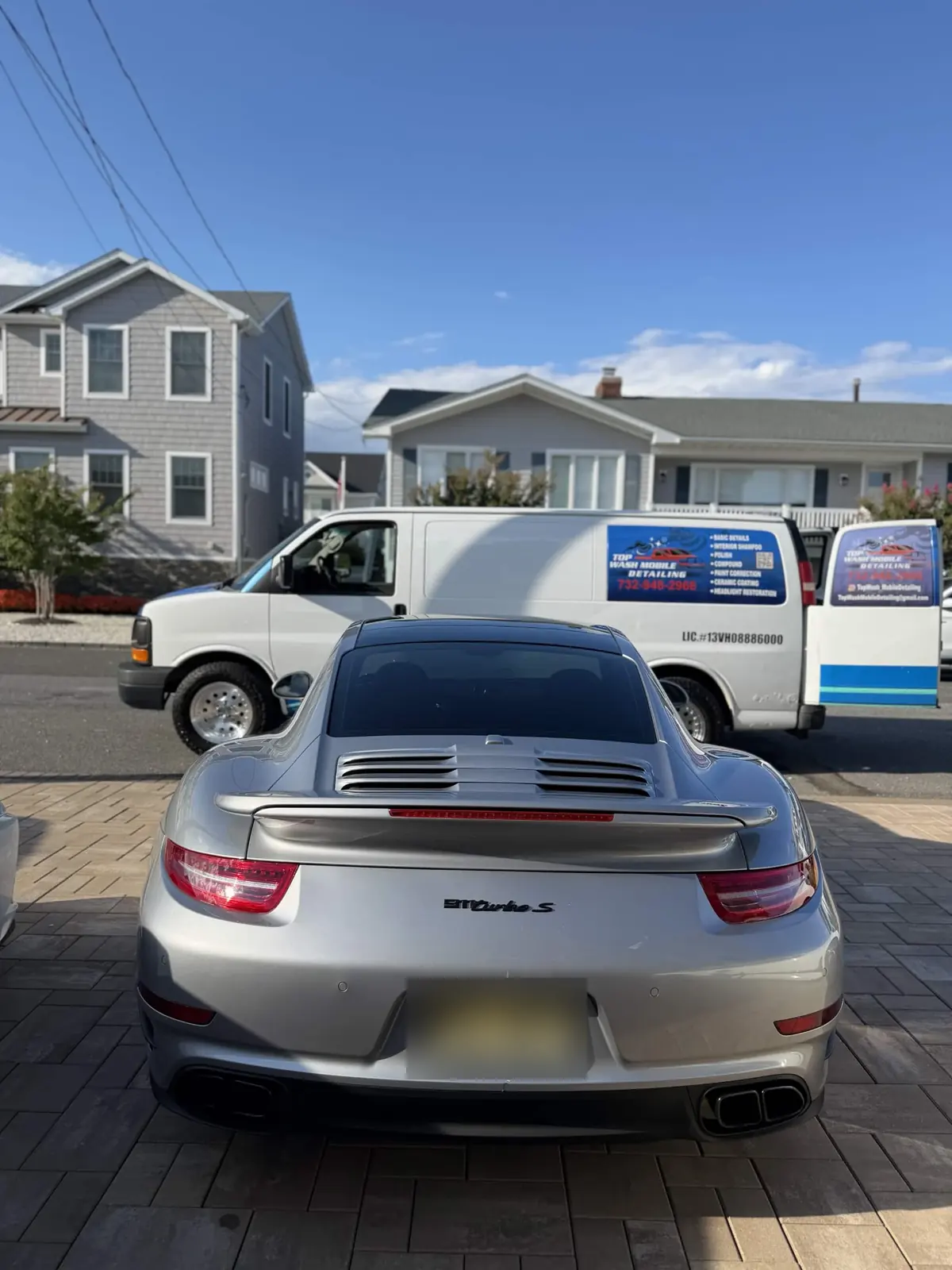 Silver Porsche 911 Turbo S rear view