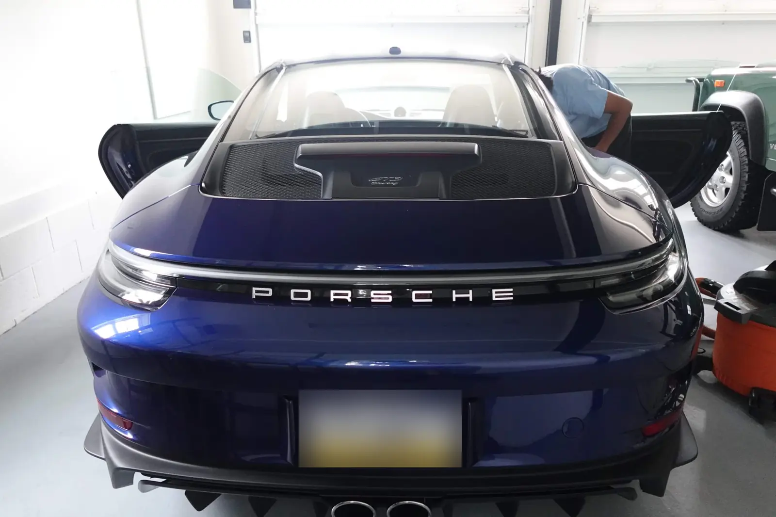 Porsche 911 GT3 Touring rear, doors open mid-detail
