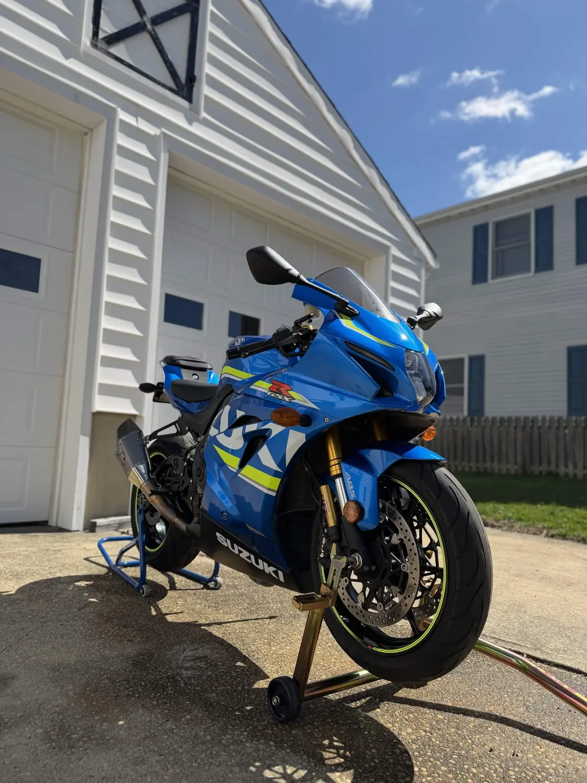 Blue Suzuki GSX-R1000 on a paddock stand