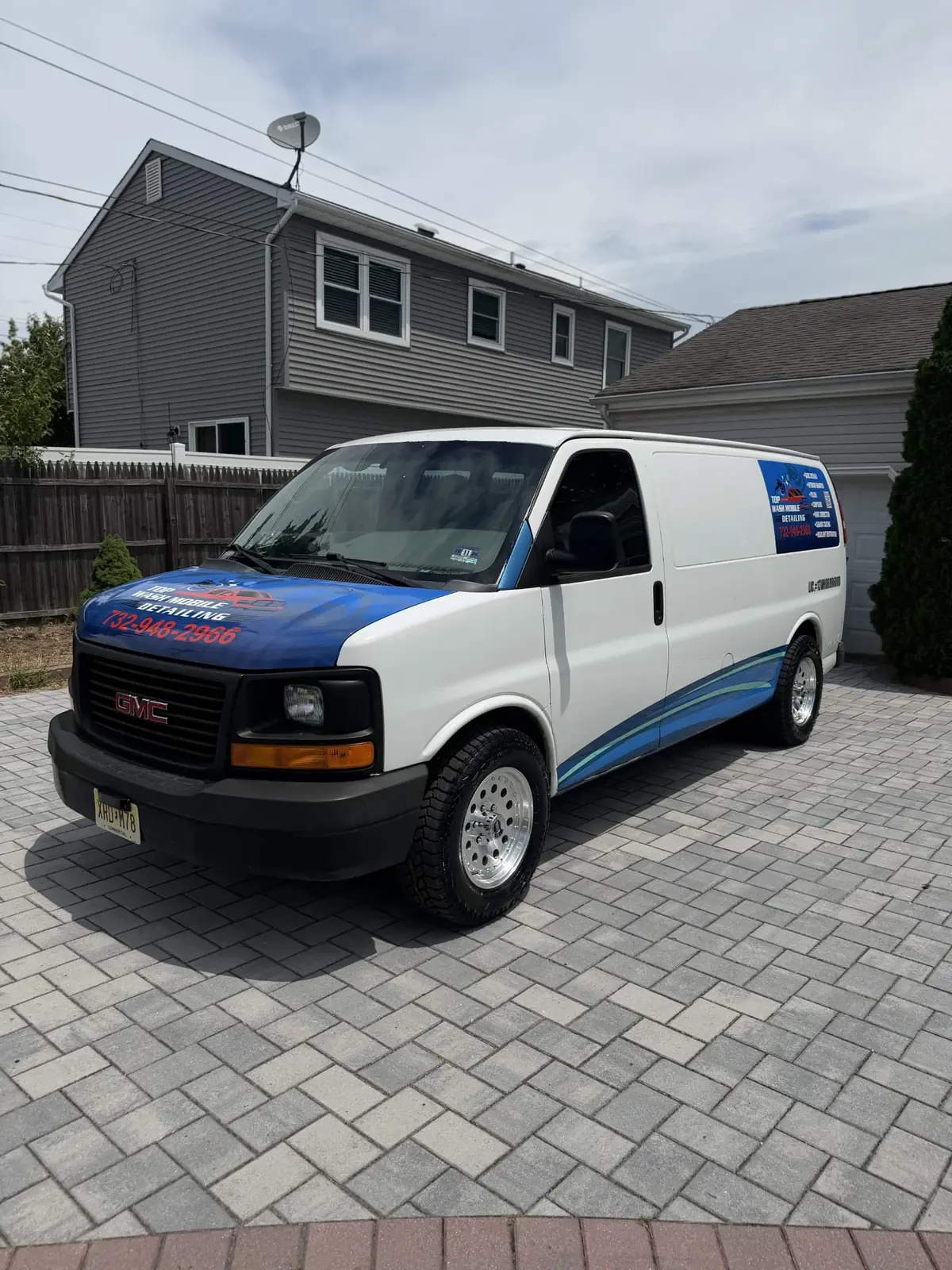 The Top Wash Mobile Detailing van in a client driveway