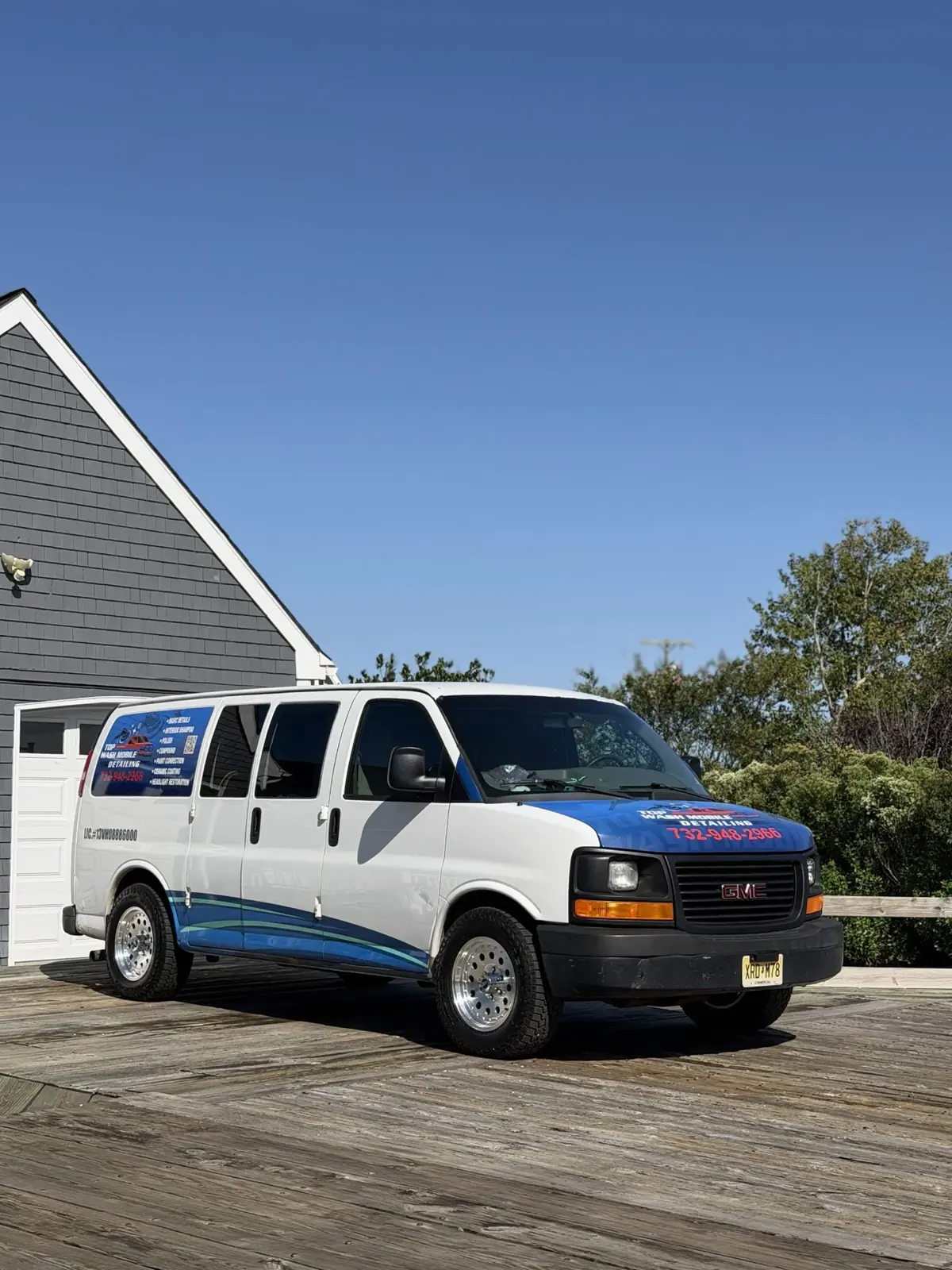 Top Wash van parked on a boardwalk